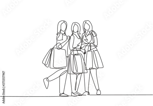 Single continuous line drawing group of beauty women holding paper bags while shopping together at mall. Business retail shopping concept. One line draw vector graphic design illustration