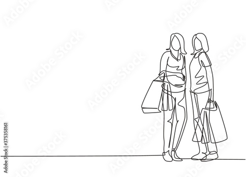 Single continuous line drawing two beauty happy women holding paper bags after shopping clothes, dress, make up, cosmetic at mall. Shopping concept. One line draw vector graphic design illustration