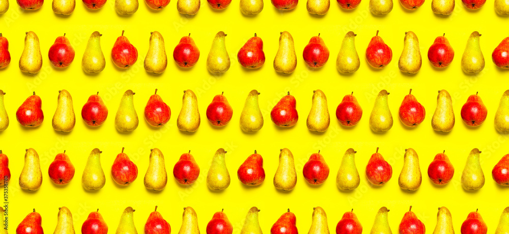 Seamless Pattern of Juicy ripe fresh green and red pears on yellow background flat lay top view copy space. Fruit background, organic healthy food. Harvest concept. Creative background with pears Seamless Pattern of Juicy ripe fresh green and red pears on yellow background flat lay top view copy space. Fruit background, organic healthy food. Harvest concept. Creative background with pears