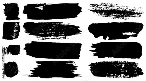 A collection of brush strokes with a dry brush. Black paint. Blots of ink