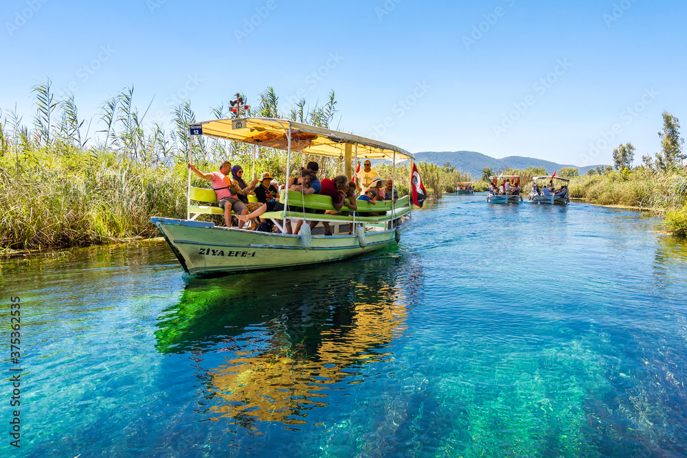 Taking tour on Azmak Stream in Akyaka Village. Akyaka is popular ...