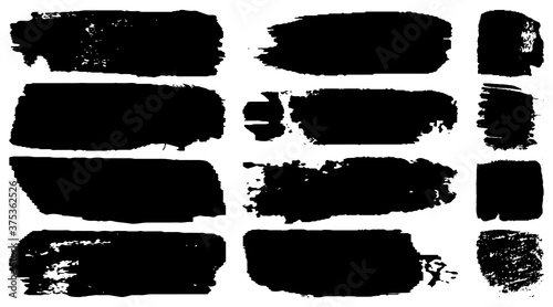 A collection of brush strokes with a dry brush. Black paint. Blots of ink