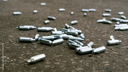 Lots of Discarded Nitrous Oxide gas canisters