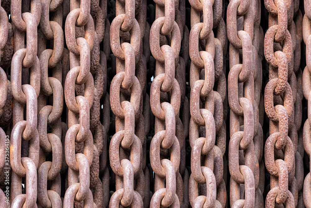 Old rusty chains illustrating a concept of terror and iron curtain Old rusty chains illustrating a concept of terror and iron curtain