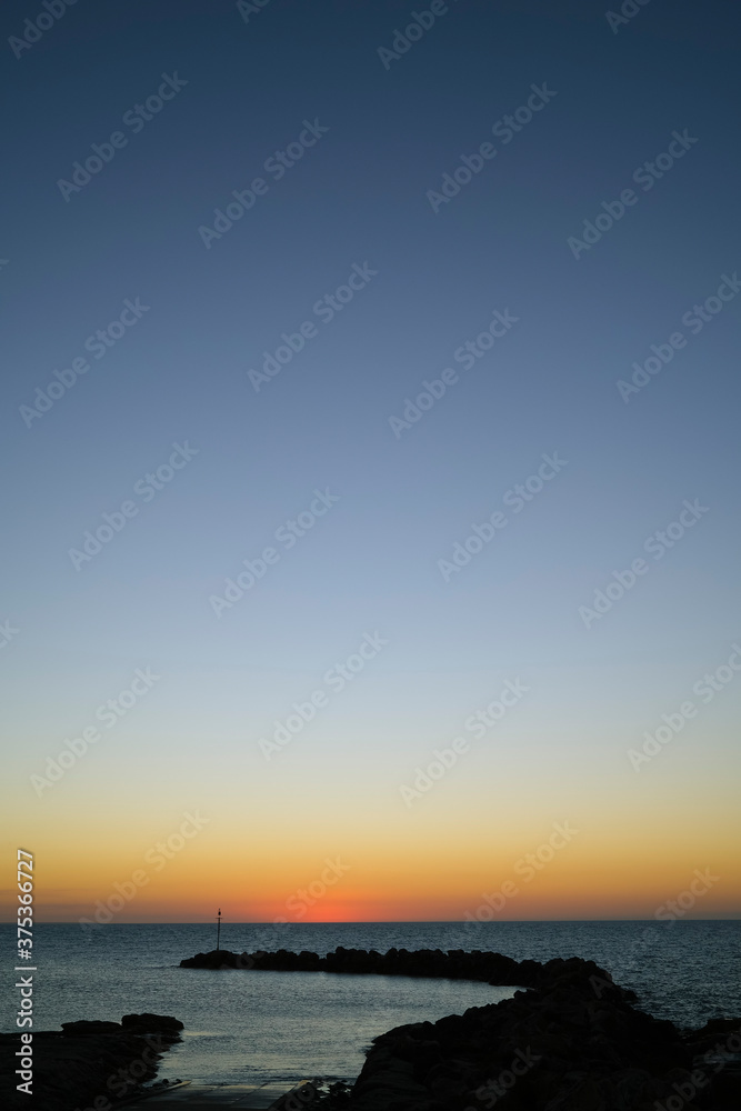 The Nightcliff boat ramp at sunset, in a suburb of Darwin, Northern territory, Australia.