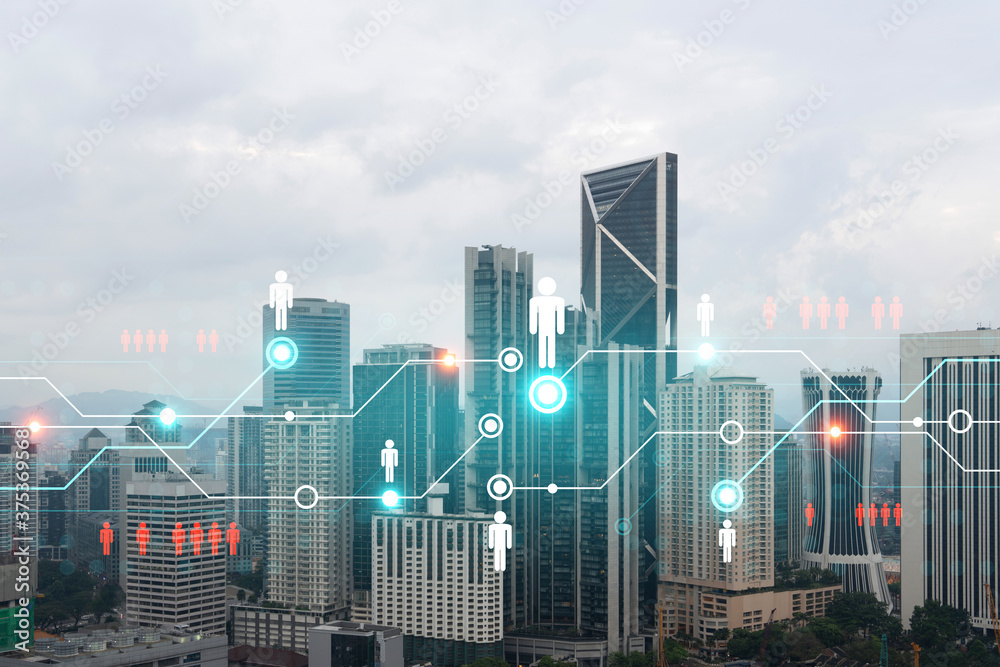 Social media icons hologram over panorama city view of Kuala Lumpur, Malaysia, Asia. The concept of people networking and connections. Double exposure. Social media icons hologram over panorama city view of Kuala Lumpur, Malaysia, Asia. The concept of people networking and connections. Double exposure.
