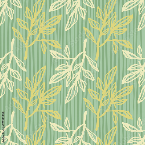 Light and yellow outline branch silhouettes seamless pattern. Doodle botanic ornament with green stripped background.