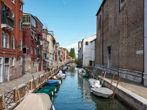 Venice and the lagoon with canals, boats and gondolas © trattieritratti