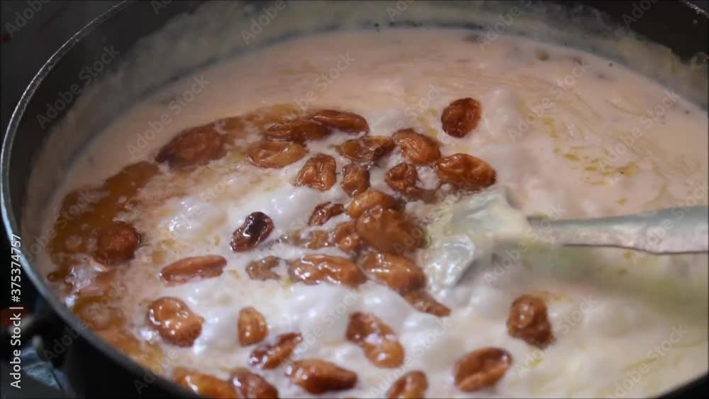 Preparing onam special Payasam with roasted dry fruits on top. Semiya Payasam or Vermicelli Payasam. Payasam is a south Indian dessert most commonly found in Kerala.