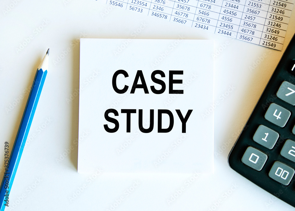 Notepad with text CASE STUDY on a white background, near calculator and office supplies. Business concept. Notepad with text CASE STUDY on a white background, near calculator and office supplies. Business concept.