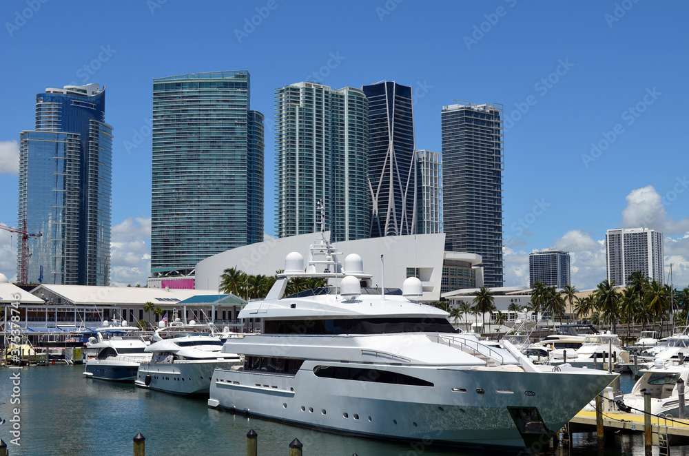 Luxury condo and office building towers overlooking a marina on the downtown Miami,Florida waterfront.