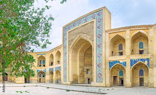 The remains of beauty of medival Modari Khan Madrassah in Bukhara, Uzbekistan photo