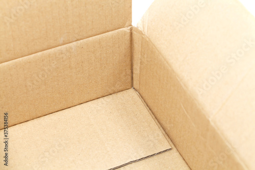 Open Cardboard Box  box open isolated over a white background.