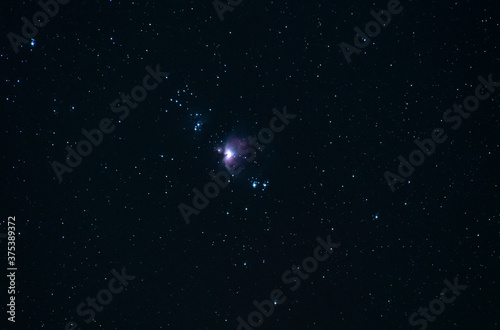 Great Orion Nebula M42 on the starry sky.  Astronomical background, deep space.