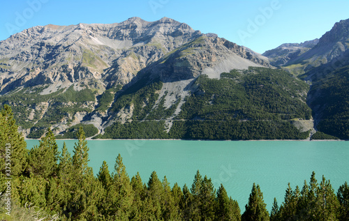 Lake Cancano is an artificial water basin adjacent to Lake San Giacomo in the Fraele valley in the municipality of Valdidentro near Bormio. photo