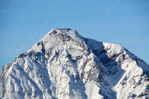 Mount Chaberton is 3,131 meters high and is a mountain in the Cottian Alps located in the French department of the Hautes-Alpes but overlooks the Susa Valley in Italy.On the top there is a fort. photo