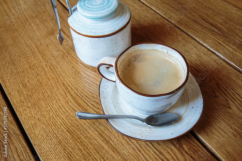 Delicious cup of coffee for business breakfast. Wooden Background. Nobody, isolated.