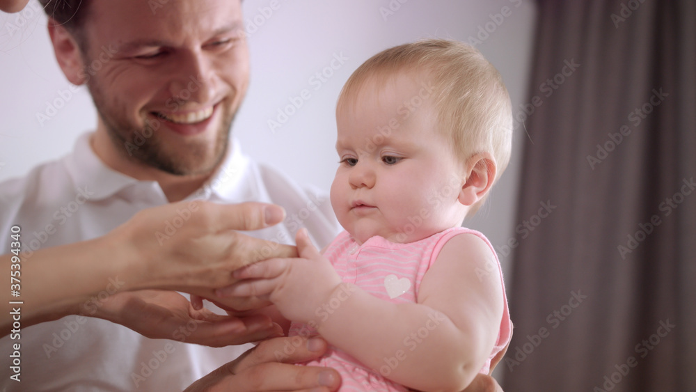 Mother and father enjoy playing with child. Joyful family enjoy togetherness Mother and father enjoy playing with child. Joyful family enjoy togetherness