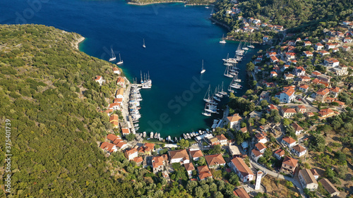 Fototapeta Naklejka Na Ścianę i Meble -  Aerial drone photo of picturesque beautiful seaside village of Kioni a safe anchorage for yachts and sail boats, a true gem of Ithaki or Ithaca island, Ionian, Greece