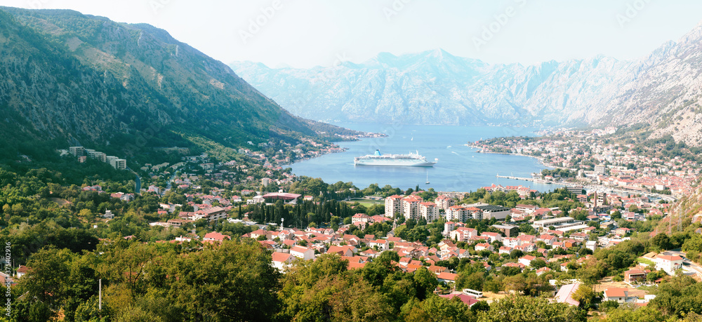 Panoramic view of the Bay of Kotor - one of the most beautiful places on the Adriatic Sea, Montenegro. It is a preserved Venetian fortress, old tiny villages, and picturesque mountains.