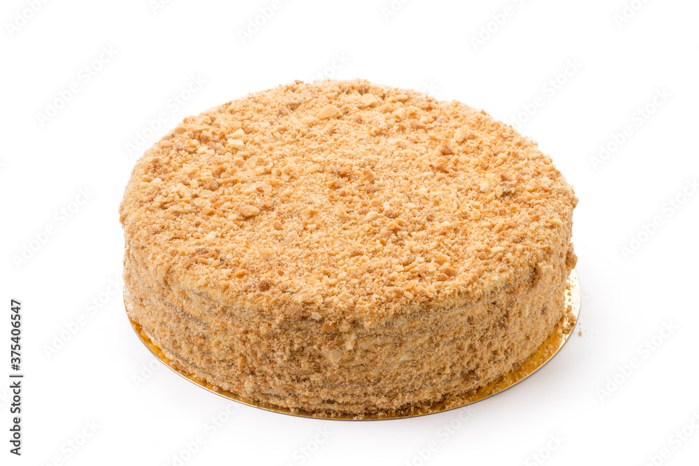 One caramel cake isolated on white background