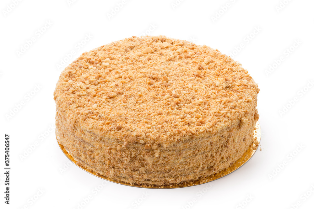 One caramel cake isolated on white background One caramel cake isolated on white background