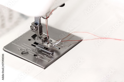Close up of sewing machine presser foot