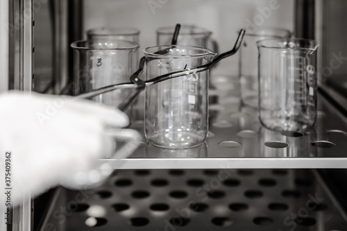Closeup of muffle furnace equipment in pharma or chemical manufacturing plant or industry. A chemical laboratory