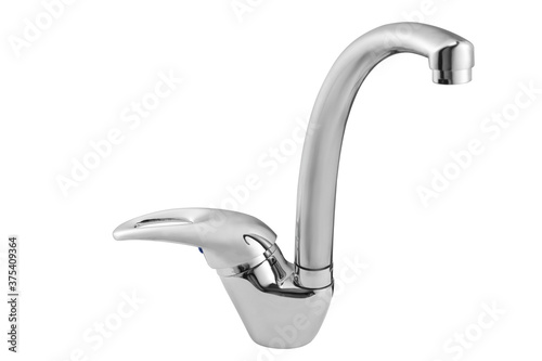 Glossy metallic faucet on white background