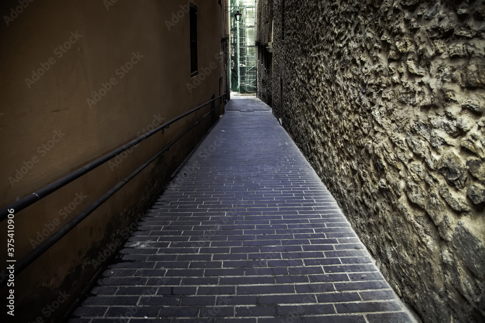 Old alley in a village Old alley in a village