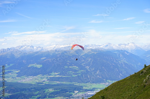 Paraglinder jumping from Plan de Corones, Dolomites, Trentino Alto Adige, Sudtirol, Italy