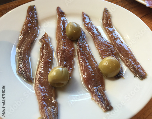 Traditional spanish anchovies and olives appetizer