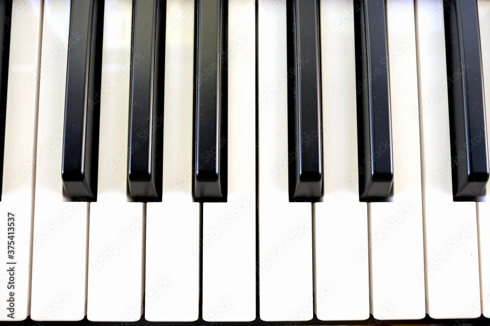 Black and white synthesizer keys music playing piano top view Black and white synthesizer keys music playing piano top view
