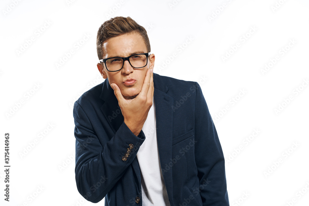 Business man in a jacket with glasses emotions official manager light background studio Business man in a jacket with glasses emotions official manager light background studio
