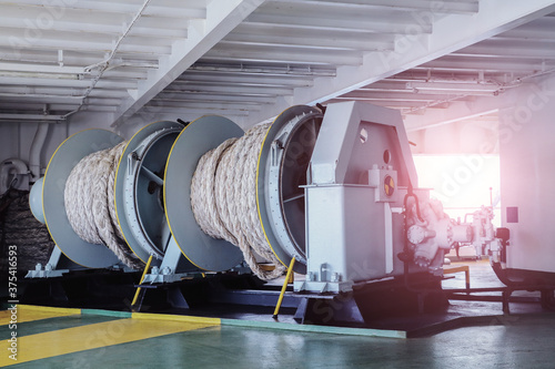 Mooring winch of large ship with winch rope in drum