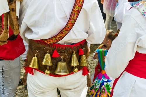 detail of costume of a man of the group Los Toros in Festival of the Iberian Mask in Lisbon, Portugal