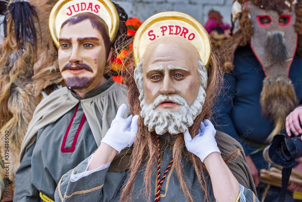 A group accompanies Our Lady of Bitterness in a procession faithful to ancient tradition in Festival of the Iberian Mask in Lisbon, Portugal