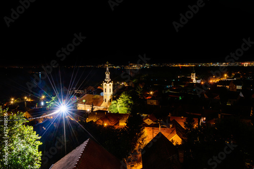 Cityscape of Zemun and St. Nicholas church at night. The Church of the Holy Father Nikolaj, or better known as the Nikolajevska Church, is an Orthodox church in Zemun, Serbia.