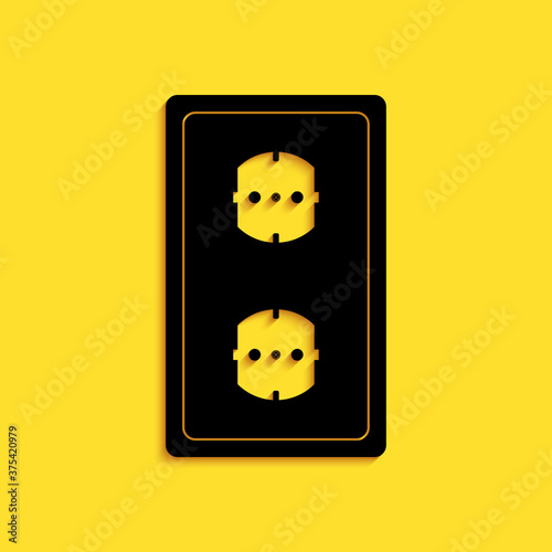 Black Electrical outlet icon isolated on yellow background. Power socket. Rosette symbol. Long shadow style. Vector.