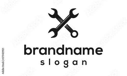 Simple wrench logo design vector