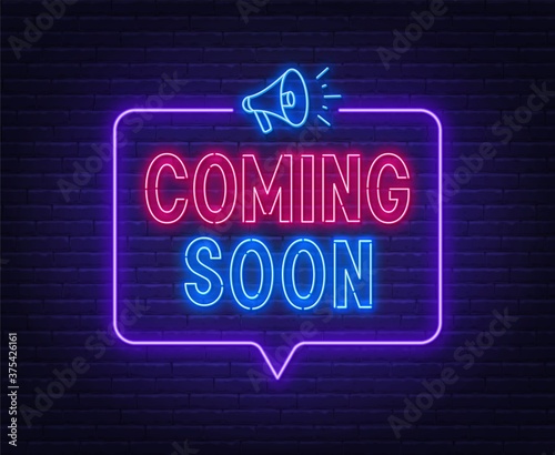 Coming soon neon sign in speech bubble frame with megaphone .