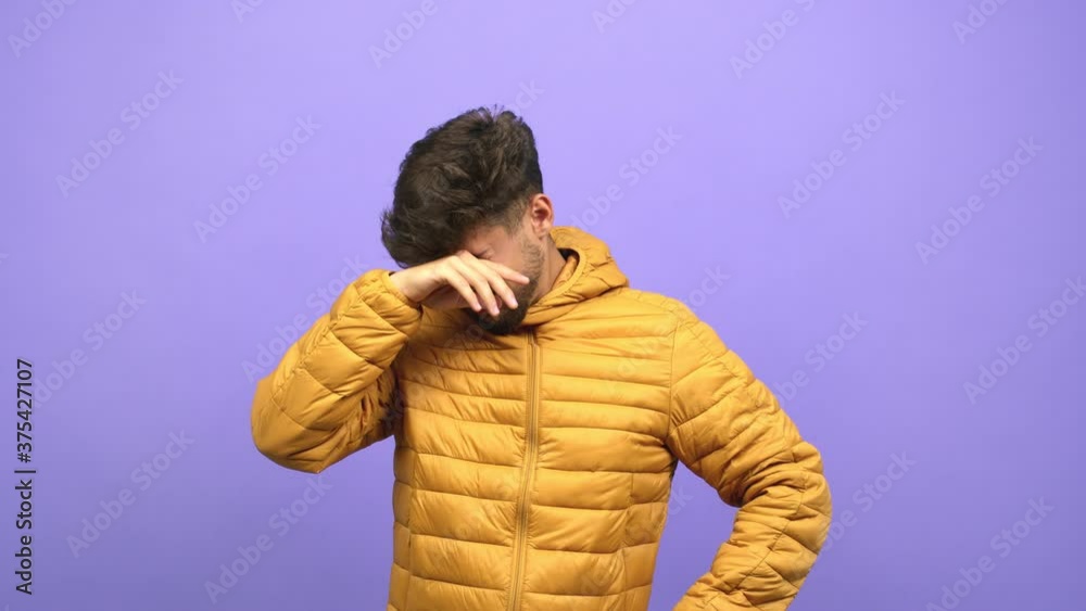 Young arab man desperate and sad, crying inconsolably, is pessimistic and melancholy Young arab man desperate and sad, crying inconsolably, is pessimistic and melancholy