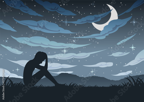 Man sit alone with sad and hopeless around with cloud sky in dark night