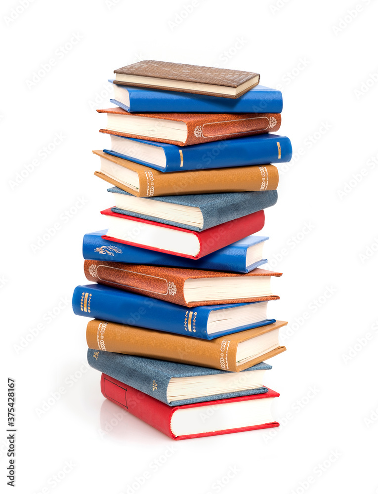 Stack of books in colour covers with white sheets isolated on a white background Stack of books in colour covers with white sheets isolated on a white background