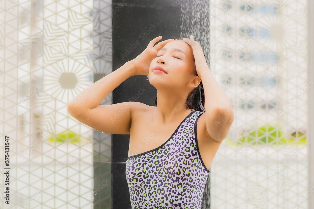 Fototapeta premium Portrait beautiful young asian woman take a shower