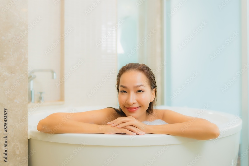 Portrait beautiful young asian woman relax smile in bathtub Portrait beautiful young asian woman relax smile in bathtub
