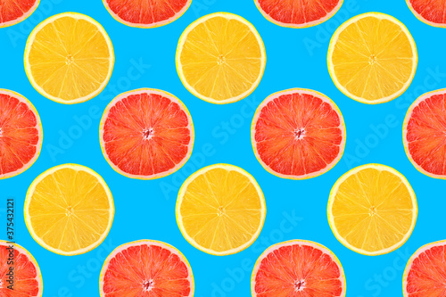 Pattern of fresh fruits isolated on creative colored texture