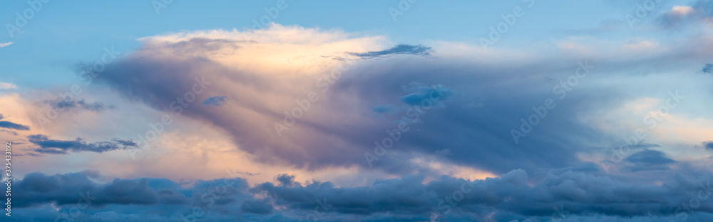 Obraz premium clouds in the sky making shapes, figures and drawings of various colours