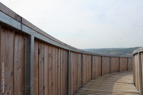 wooden bridge over the field