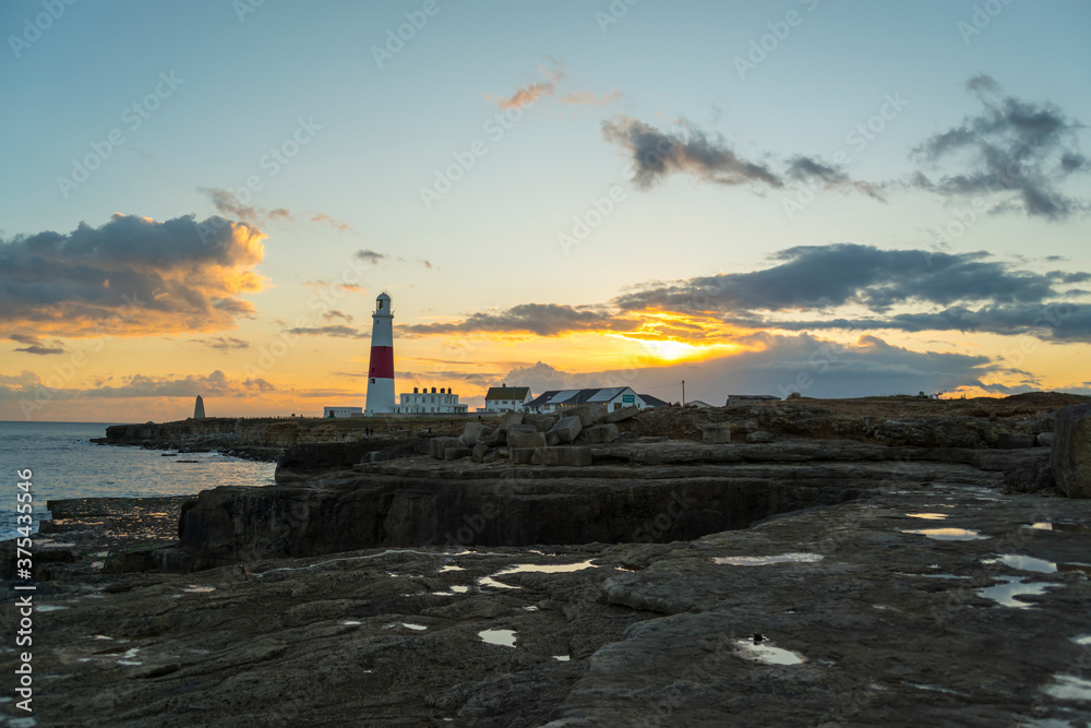 Portland Bill Lighthouse and boat houses in Dorset
